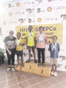 Lucky students showcasing medals won