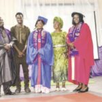 Olayiwola with parents and Prof. Ayoola (right)