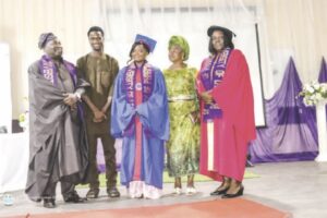 Olayiwola with parents and Prof. Ayoola (right)
