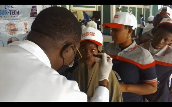 One of the beneficiaries going through an eye test