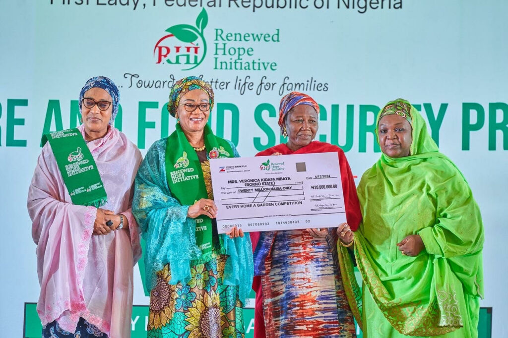 Wife of the Vice President and National Vice Chairman of RHI, Hajia Nana Shettima, First Lady of Nigeria, Oluremi Tinubu and National Chairman of the RHI, Winner of the RHI powered #EveryHomeAGarden Competition, Veronica Kidafa Mabaya from Borno State, wife of the Borno State Governor, Falmata Babagana Zulum and the Minister of State for Agriculture and Food Security Sabi Abdullahi at the announcement of the winner of the competition held at State House Abuja on Wednesday 4th December, 2024