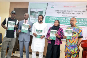 Mr. Suraju (middle) and other participants at the event