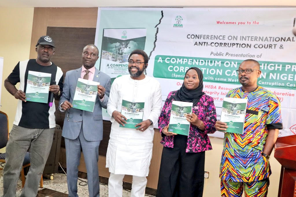 Mr. Suraju (middle) and other participants at the event