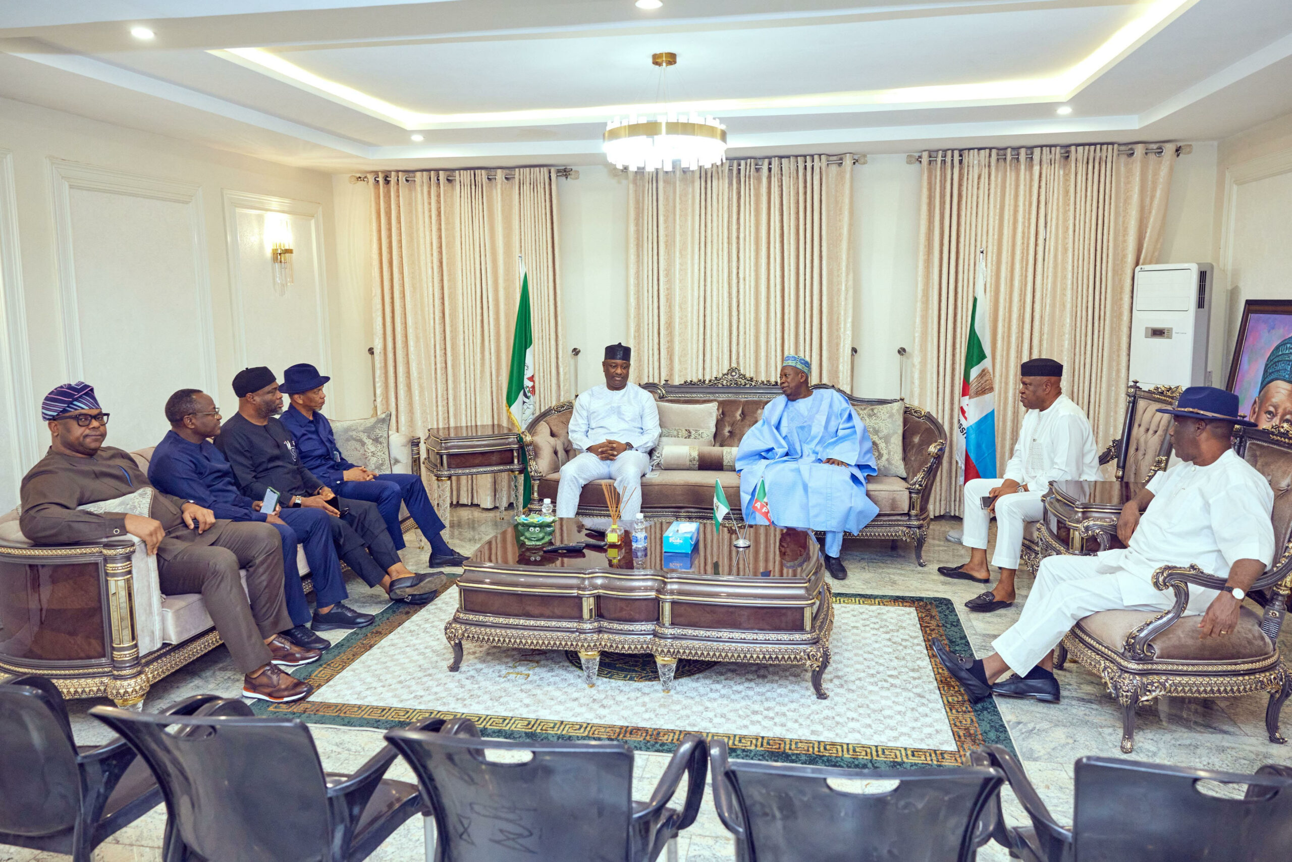 Minister of Aviation Festus Keyamo (seated center left) and Ex-Kano Governor Abdullahi Ganduje (seated centre right)