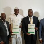 L-R: Immediate Past President of NAPPS, Alhaji Olawale Amusa; NAPPS, Lagos President, Chief Alaka Yusuf; CEO/Chairman of DLN, USA, Mr Thomas Larmena; and Executive Vice President, DLN, John Akpan, during the signing ceremony