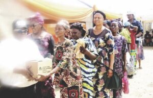 Amaefula presenting food items to the widows