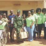 Members of the group with some of the health centre representatives after receivig the equipment