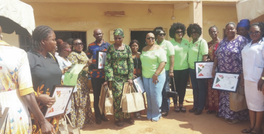 Members of the group with some of the health centre representatives after receivig the equipment