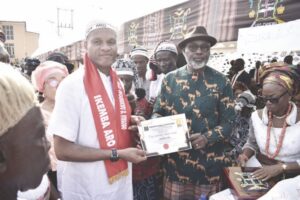 One of the awardees receiving his certificate of recognition