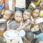 Poor kids with bowls