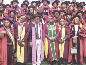 Prof. Osinubi (middle); SPGS officials with the graduates