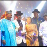 FCT Minister Nyesom Wike (3rd left) flanked by the Minister of Information and National Orientation, Mohammed Idris (2nd left), his Wife Justice ES Nyesom Wike (JCA) (4th left) and other well-wishers receiving his Award as Minister of the  Year during the Arise TV/Thisday Newspaper Awards ceremony in Lagos on Monday