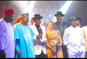 FCT Minister Nyesom Wike (3rd left) flanked by the Minister of Information and National Orientation, Mohammed Idris (2nd left), his Wife Justice ES Nyesom Wike (JCA) (4th left) and other well-wishers receiving his Award as Minister of the  Year during the Arise TV/Thisday Newspaper Awards ceremony in Lagos on Monday