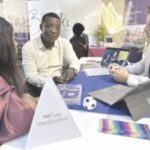 •A parent interacting with school officials