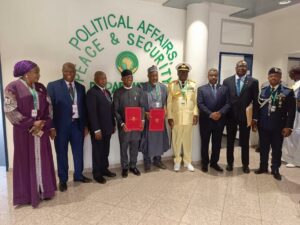 Nigerian Officials, led by the Minister of Defence Mohammed Badaru Abubakar  at the signing of the Memorandum of Understandng (MoU) between AU and Nigeria for strategic sea lift services