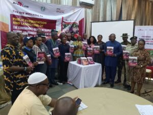 Participants at the launching of the community-based research report on human rights violation in the palm oil supply chain in Edo State