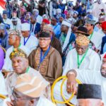 Ovie Omo-Agege (middle of shot, surrounded)