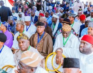 Ovie Omo-Agege (middle of shot, surrounded)