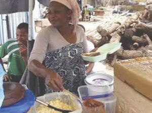 Joy Adeh, popularly known as “Kpai kpai”, at Liberty Junction, Kubwa, Abuja