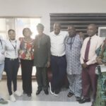 Kolawole Bakare flanked by others at the opening ceremony