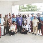 Members of the group with the officials