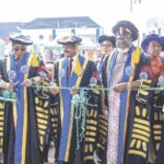 Mrs. Nwifuru (left) flagging off the eye centre