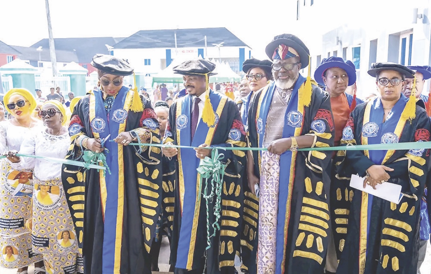 Mrs. Nwifuru (left) flagging off the eye centre
