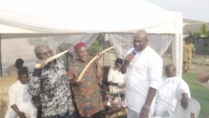 Nwachukwu (left) being welcomed