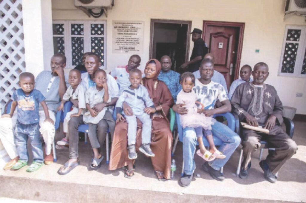 Some of the recovered children with their families