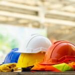 Close,Up,Blue,,Yellow,,White,And,Red,Hard,Safety,Helmet