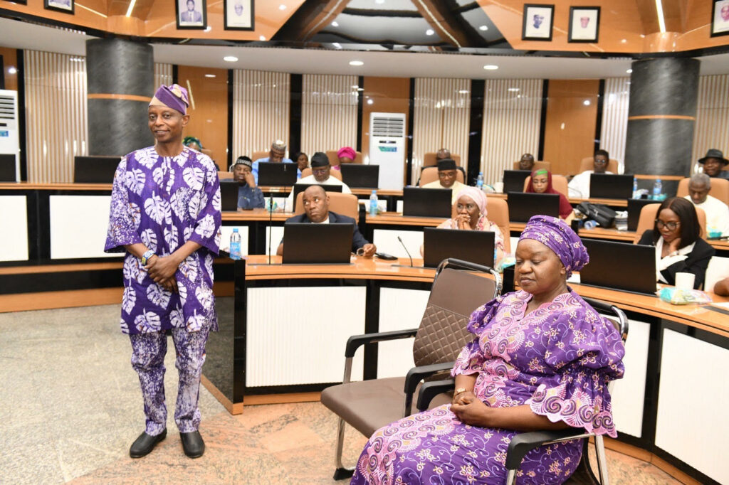 Permanent Secretary, Ministry of Transportation, Adeoye Ayodeji,(standing) his wife, and a cross section of Permanent secretaries during the valedictory Session, in Abuja