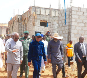 FCT Minister Nyesom Wike (m) flanked by Ag. ES FCDA, Richard Dauda (1st left) and  Adapoyi, MD Details2Dot Development Nig. (2nd right) during the Minister’s inspection of construction of judges quarters in Abuja on Wednesday