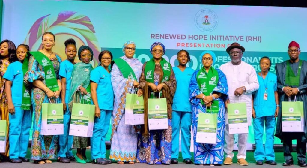 First Lady of Nigeria Oluremi Tinubu(m) flanked on the left by the Wife of the Vice President of Nigeria, Nana Shettima with the Delta State Governor, Sheriff Oborevwori and his wife, Tobore Oborevwori with other other dignitaries and midwives who received the donation of 10,000 scrubs and 10,000 pairs of crocs donated to the South-South Geopolitical Zone by the Renewed Hope Initiative, RHI in Asaba Delta State on Tuesday 25th March, 2025
