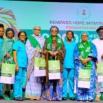 First Lady of Nigeria Oluremi Tinubu(m) flanked on the left by the Wife of the Vice President of Nigeria, Nana Shettima with the Delta State Governor, Sheriff Oborevwori and his wife, Tobore Oborevwori with other other dignitaries and midwives who received the donation of 10,000 scrubs and 10,000 pairs of crocs donated to the South-South Geopolitical Zone by the Renewed Hope Initiative, RHI in Asaba Delta State on Tuesday 25th March, 2025