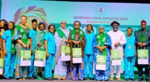 First Lady of Nigeria Oluremi Tinubu(m) flanked on the left by the Wife of the Vice President of Nigeria, Nana Shettima with the Delta State Governor, Sheriff Oborevwori and his wife, Tobore Oborevwori with other other dignitaries and midwives who received the donation of 10,000 scrubs and 10,000 pairs of crocs donated to the South-South Geopolitical Zone by the Renewed Hope Initiative, RHI in Asaba Delta State on Tuesday 25th March, 2025