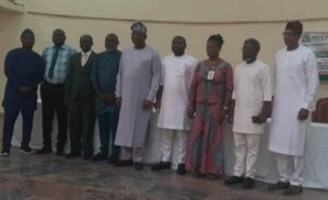 Deputy Governor Barr Sam Ode in a photograph with other signatories at the event