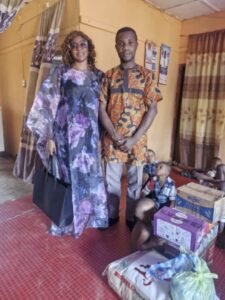 Adisa (left) during visit to motherless babies home