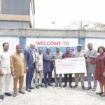 Beneficiaries with the cheque