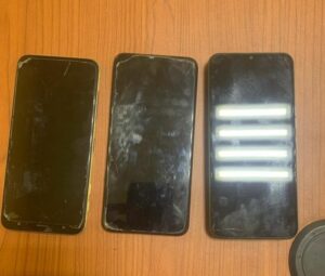 Burglar with stolen phones in Lagos