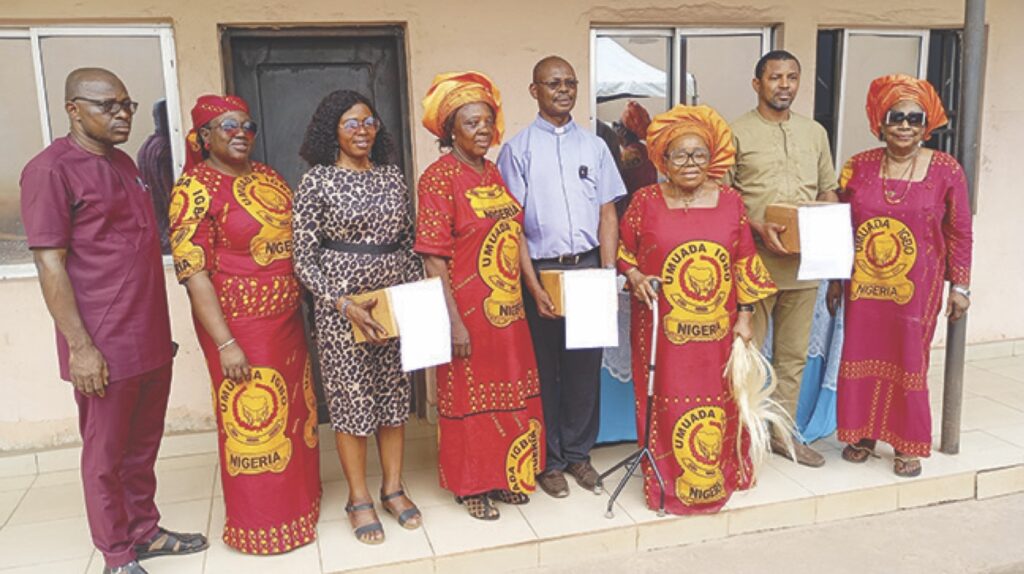 Ezeofor (3rd right) with others during distribution