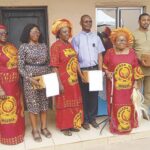 Ezeofor (3rd right) with others during distribution