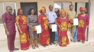 Ezeofor (3rd right) with others during distribution