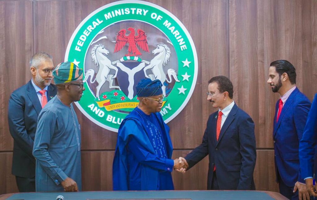 Nigeria’s Minister of Marine and Blue Economy Adegboyega Oyetola (L centre) welcomes team from DP World UAE led by their Group Chairman and CEO, Sultan Ahmed bin Sulayem (R centre)