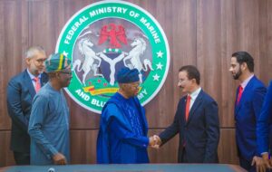 Nigeria’s Minister of Marine and Blue Economy Adegboyega Oyetola (L centre) welcomes team from DP World UAE led by their Group Chairman and CEO, Sultan Ahmed bin Sulayem (R centre)
