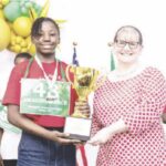 Gorg (right) presenting trophy to Salami