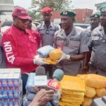 Ogun Customs boss, Mohammed Shuaib, handing over seized illicit drugs to the authorities of the NDLEA