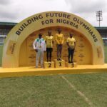 Suzan Christopher (m) gold medalist in Discus flanked by other athletes at the just concluded MTN Champs Season 3 competition held at the Samuel Ogbemudia Stadium, Benin City