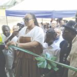 Jaja cutting the tape of the JAMB CBT Centre.