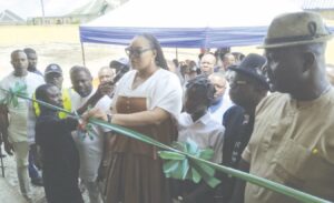 Jaja cutting the tape of the JAMB CBT Centre.