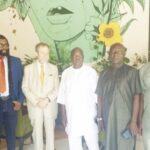 Manuel Innocencio (3rd left) flanked by members of BAA
